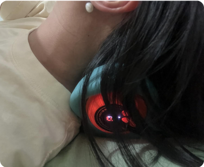 Customer using neck massager at home